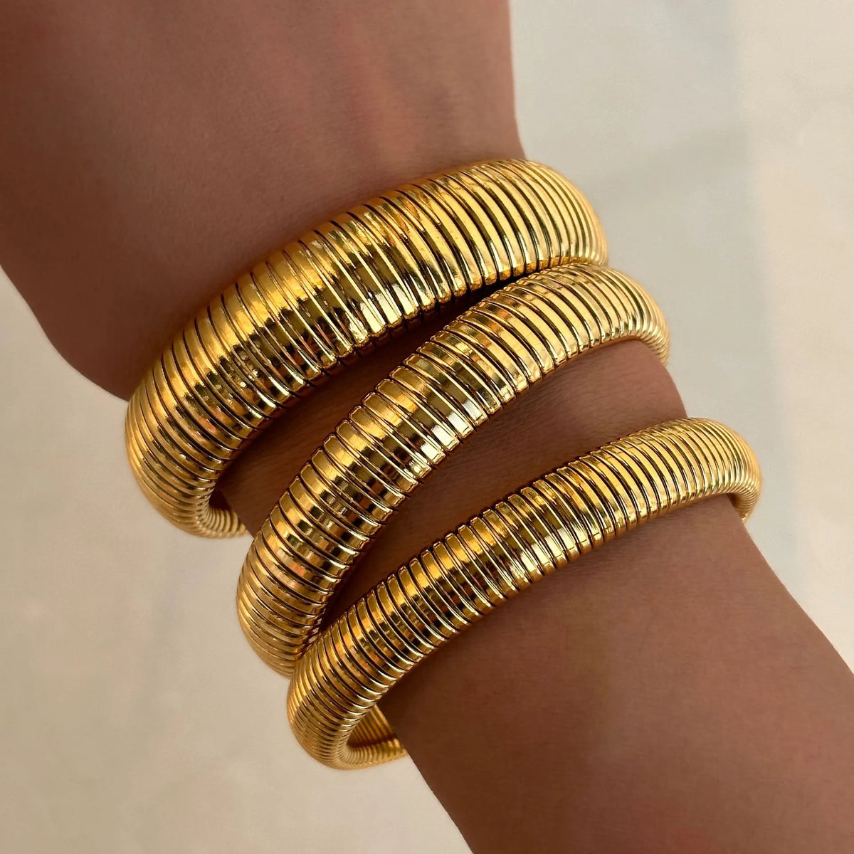 Stackable vintage gold bangles
